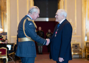 Dr David Brohn Receives MBE from King Charles at Windsor Castle